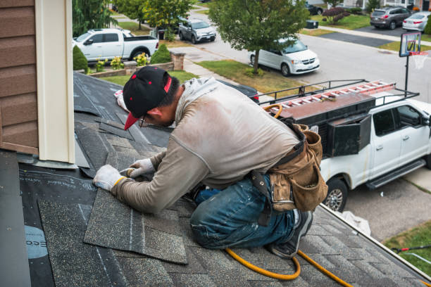 Professional Roofing technician working in Harrah, OK
